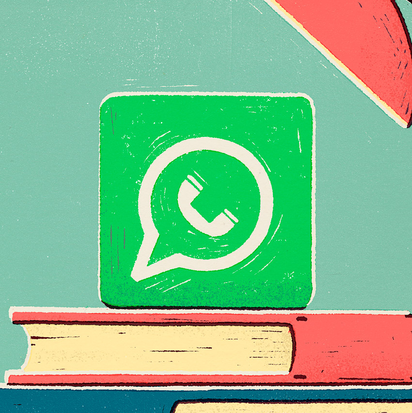 Whatsapp icon on top of two books